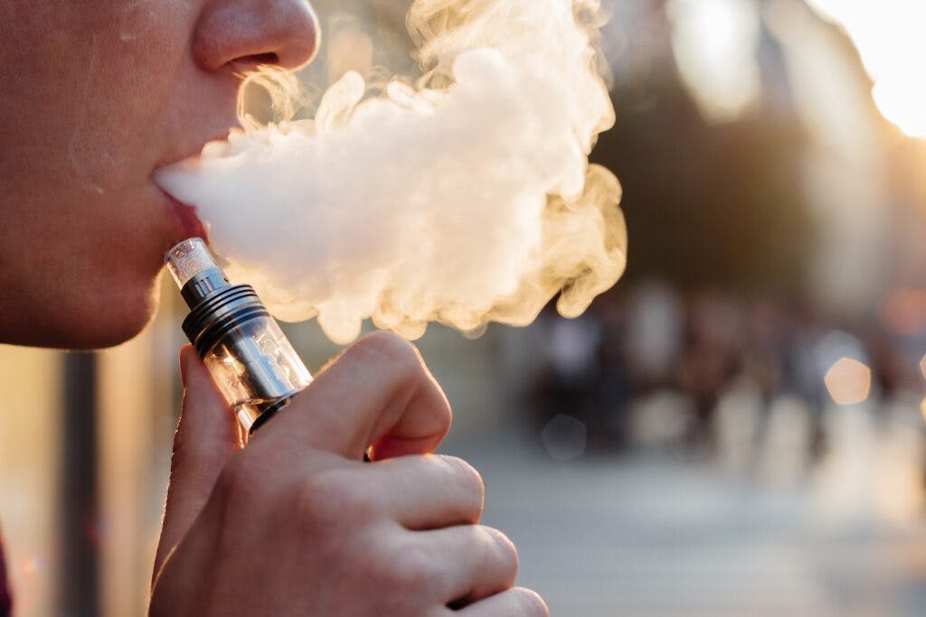 man using vape